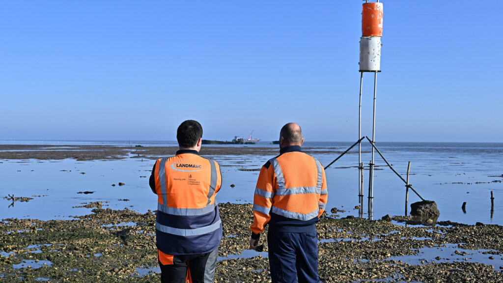 Landmarc employees conducting a routine inspection on Target 5, with the newly installed target visible in the background.