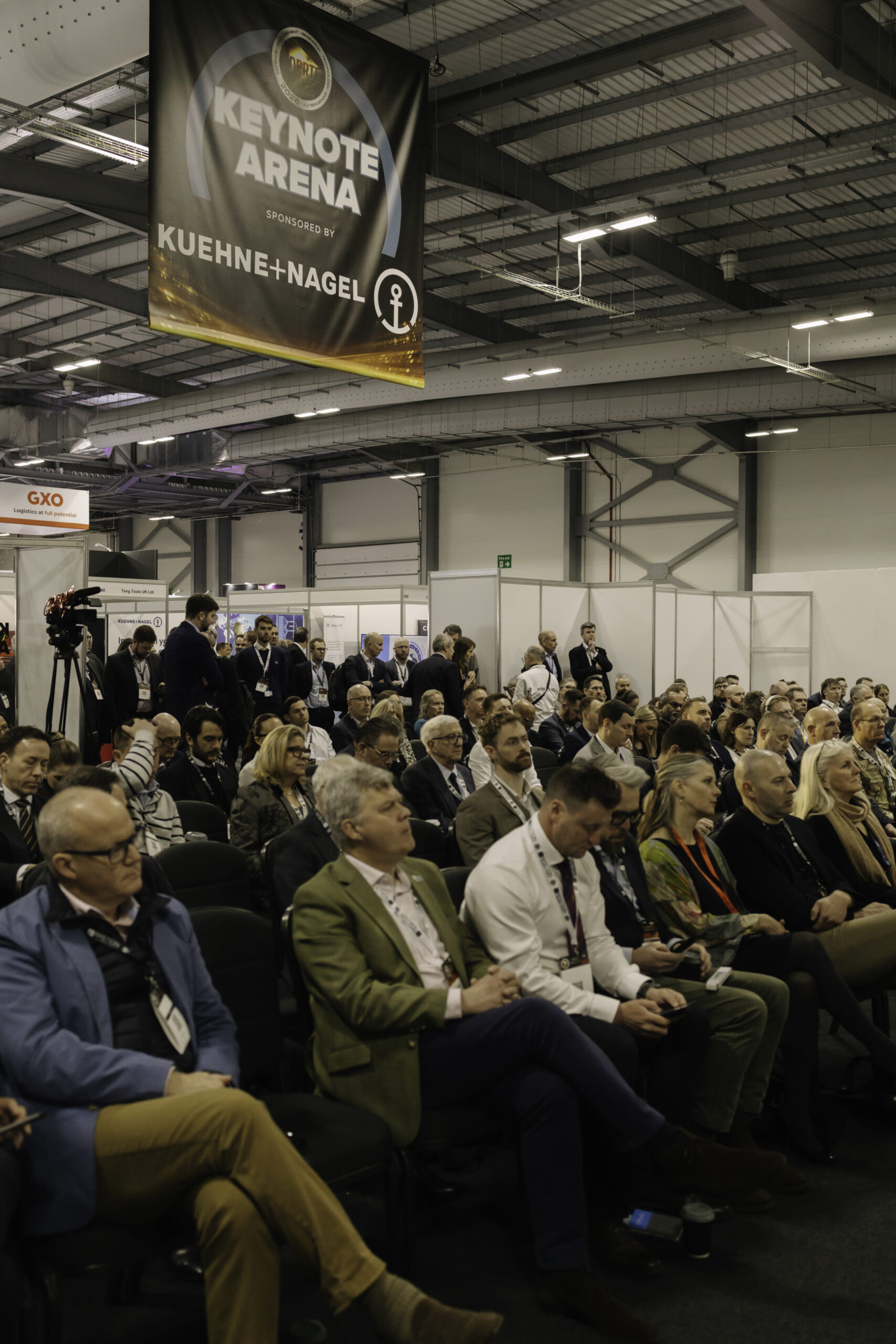 Delegates in conversation at DPRTE Expo